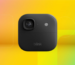 two small, black square security camera devices against a pink and black gradient with the text "BLACK FRIDAY" in the background