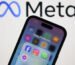 Meta logo displayed on a laptop screen and Facebook, Instagram, WhatsApp and Messenger icons displayed on a phone screen are seen in this illustration photo.