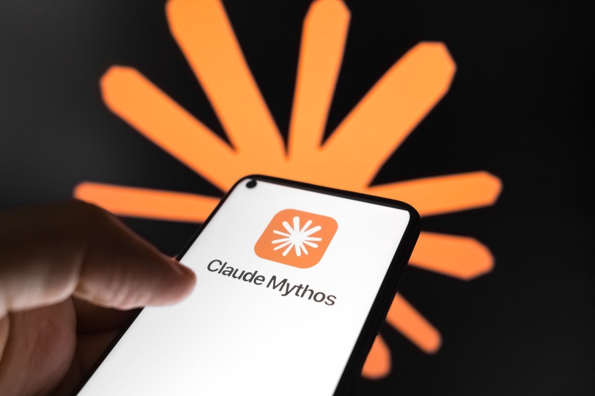 The Claude Mythos logo appears on a smartphone screen, and the Claude AI logo displays as the background on a laptop computer screen.