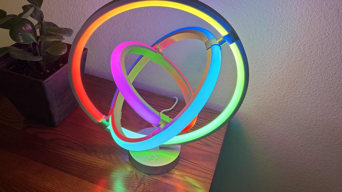 Lepro's AI lamp showing multiple colors on a table.