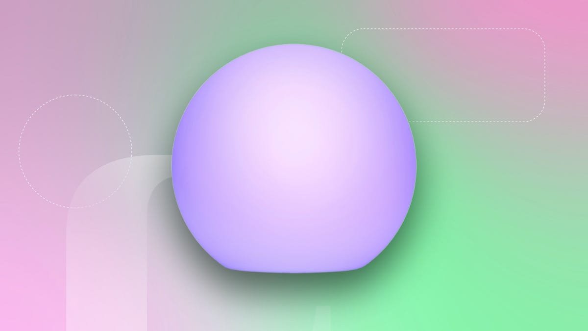 A glowing purple orb lamp displayed against a gradient pink and green background