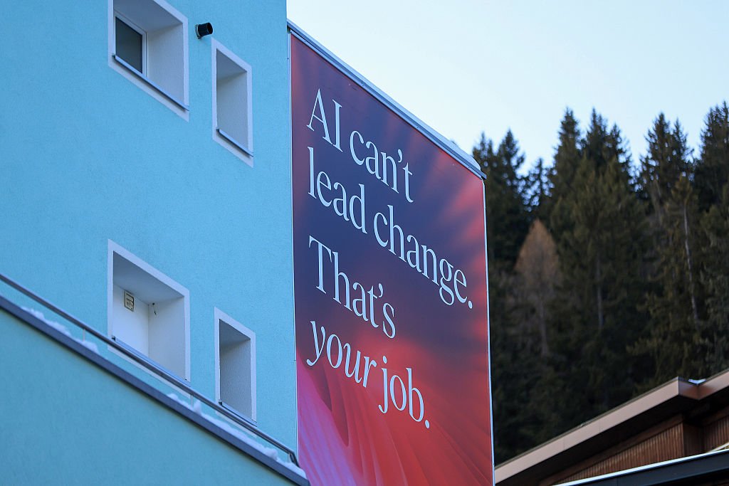 A slogan reading "AI Can't Lead Change. That's Your Job" on a pavilion ahead of the World Economic Forum(WEF) annual meeting in Davos, Switzerland, on Sunday, Jan 18, 2026.