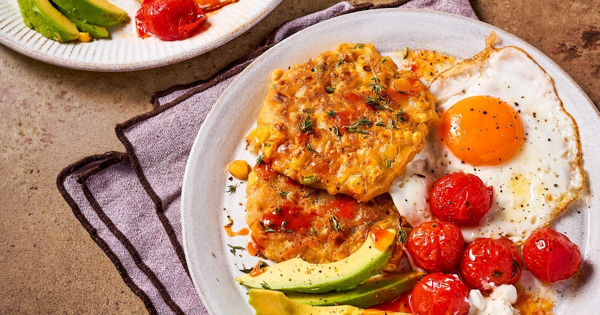 Corn cakes, avocado, eggs & jammy tomatoes recipe